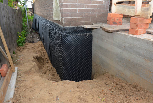 Happy homeowners after waterproofing job in Owensburg